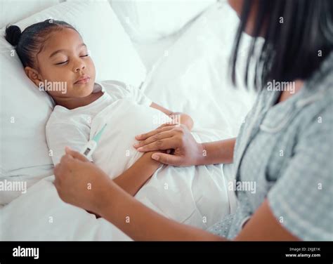 Girl, sick and mom with thermometer in bed for allergies, fever and viral infection in family ...