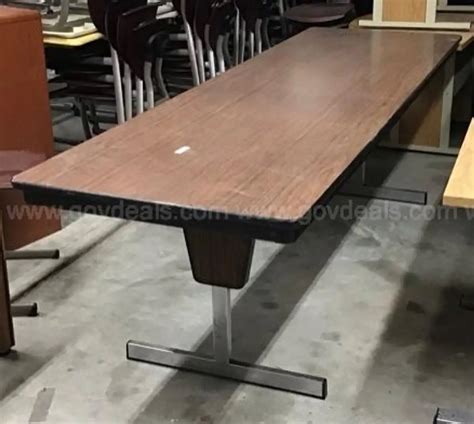 Adj. 8' folding table | AllSurplus