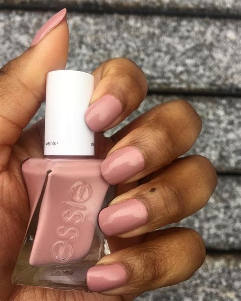 Essie Polish "Princess Charming" on dark skin. Nude nail polish on dark skin. Nail polish on ...