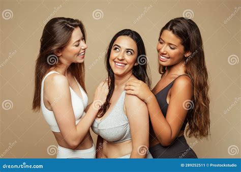 Cheerful Young Spanish, Arab and European Women in Different Underwear ...