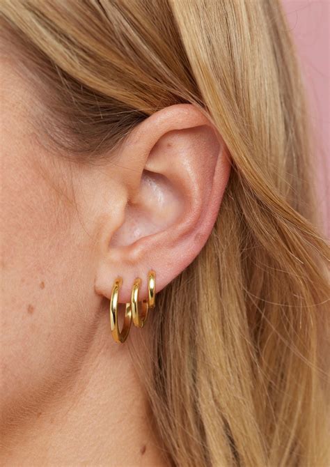 Polished Gold Huggies - Large | Ear jewelry, Charm earrings, Gold