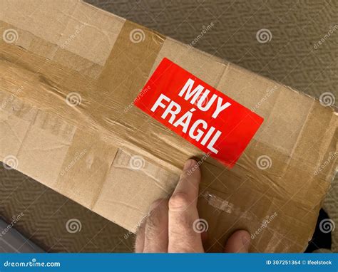 Handle with Care: Muy Fragil Stock Photo - Image of delivery, parcel ...