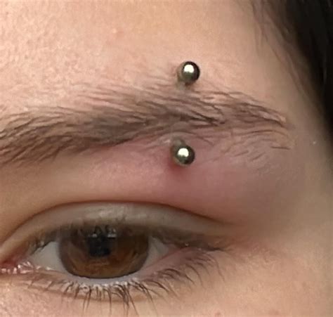 Is my eyebrow piercing infected? : r/piercing