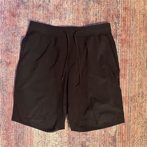 men’s black lululemon athletic shorts tag ripped off... - Depop