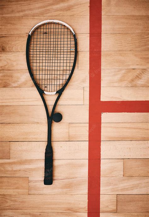 Download Caption: Squash Essentials - A Racket and Ball Beside the Red ...