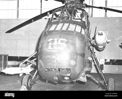 USMC experimental CH-34 helicopter armed with the Navy's Bullpup ...