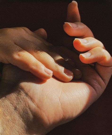 Woman Holding Baby Near Window · Free Stock Photo