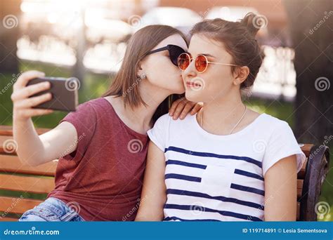 Women Lesbians Enjoy Spare Time in Park, Pose for Making Selfie in ...