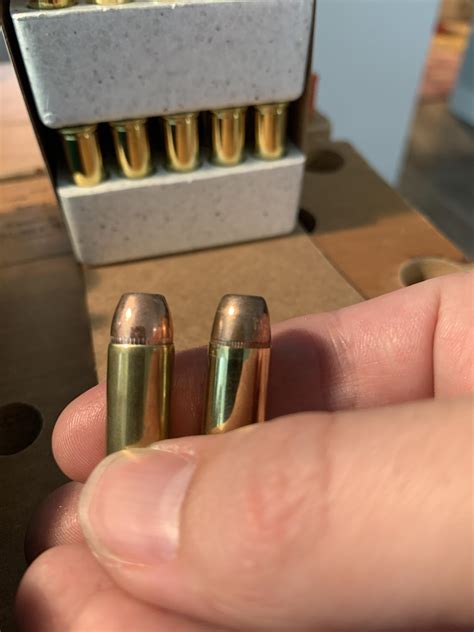 First .38 special reloads (featuring heavy crimp). my load on the left ...