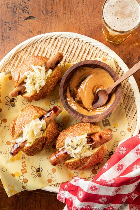 Mini Brats with Sauerkraut and Honey Hot Sauce – Savannah Bee Company