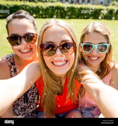 Group girls taking selfie social hi-res stock photography and images ...