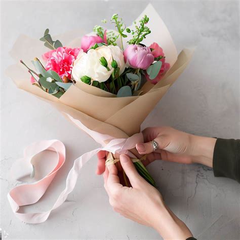 How to Wrap a Hand Tied Bouquet in Paper - A Step-by-Step Guide ...