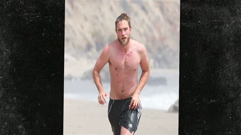 Robert Pattinson -- Shirtless and Forgotten -- Twilight vs. Hunger Games