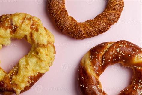 Three different types of pretzels on a pink background 54651276 Stock ...