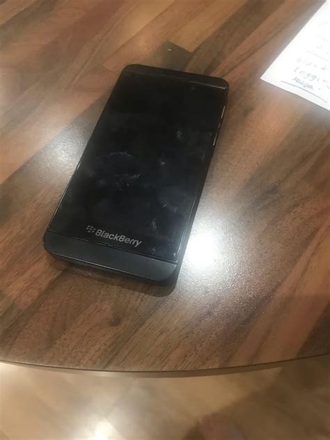 Could you help me identify this blackberry phone model and the charger ...