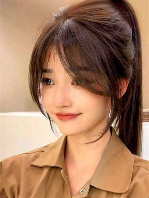 Effortlessly Elegant High Ponytail with Soft Curtain Bangs,Modern Chic ...
