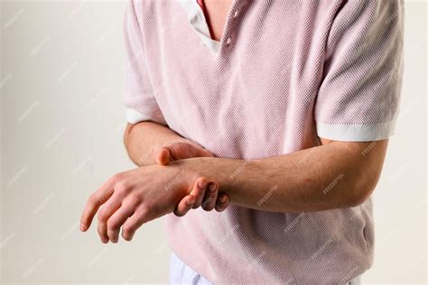 Premium Photo | Rheumatoid arthritis causes pain and swelling of wrist Numbness of arm caused by ...