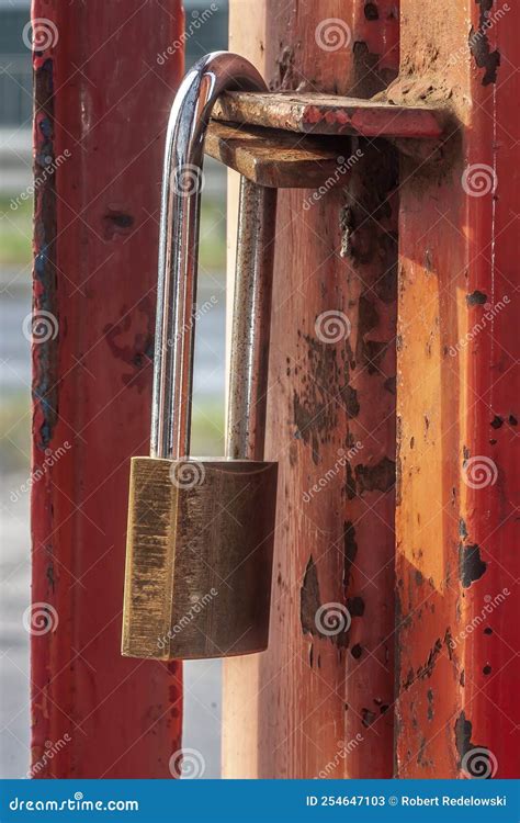 Old Worn Padlock Locked on the Paint-shabby Gate. Stock Image - Image ...