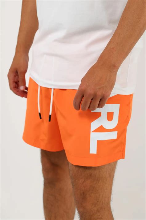 Karl Lagerfeld - Orange swimming costume with white vertical maxilogue ...