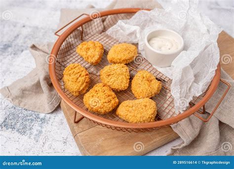 Air Fried Breaded Chicken Nuggets in a Basket with Dip and Ready To ...