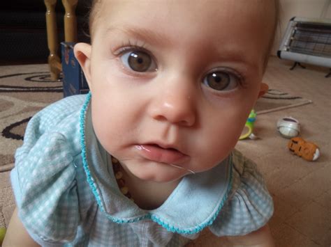 Newborn Baby Girl With Hazel Eyes
