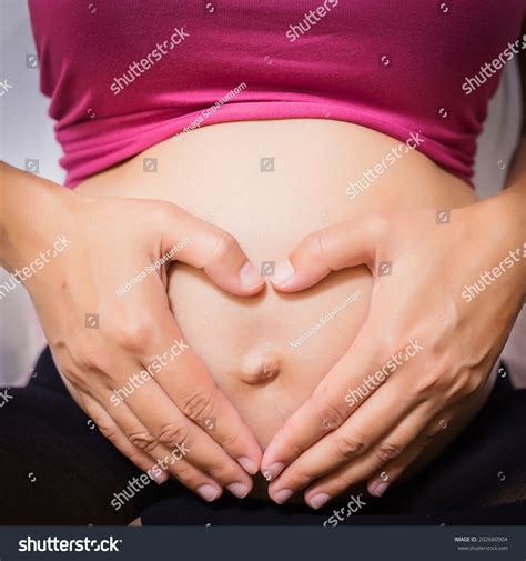 Pregnant Belly Button Pop