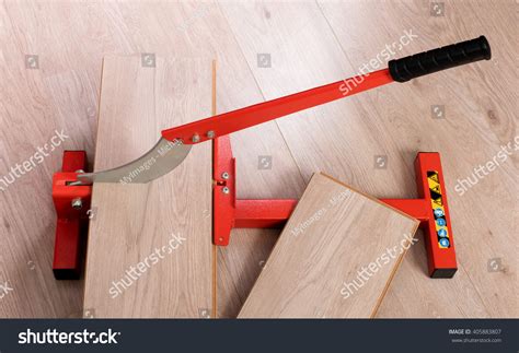 Red Tool Cutting Laminate On Laminate Stock Photo (Edit Now) 405883807