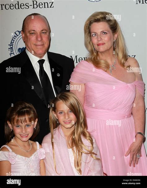Nancy Davis husband Ken Rickel with daughters Isabella Rickel and ...