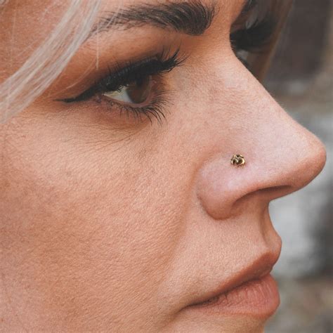 Do Nose Piercings Hurt? Pain Levels, Tips & Aftercare Guide - Stretch ...