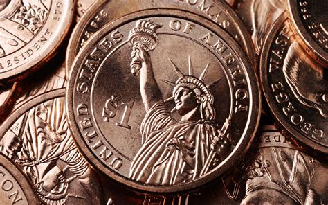 Download United States Dollar Coins Closeup Wallpaper | Wallpapers.com