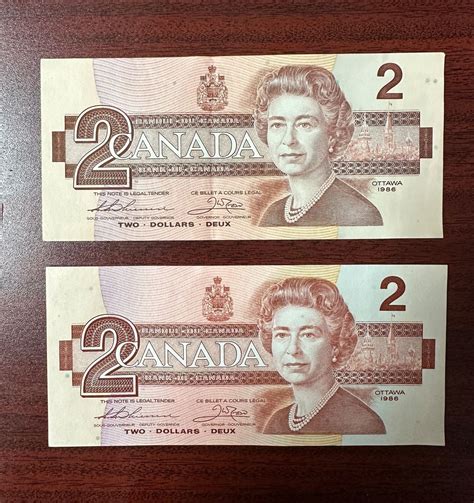 Group of two Bank of Canada 2 dollar bills from 1986