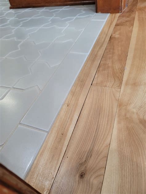 Transition between Tile And Hardwood: Seamless Solutions