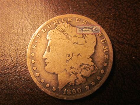1890 - O - Morgan Silver Dollar - Coin In Photo
