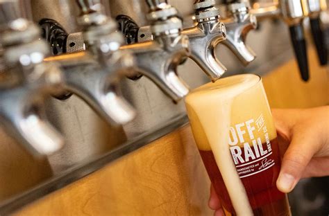 off-the-rail-beer-pouring - Off The Rail Brewing