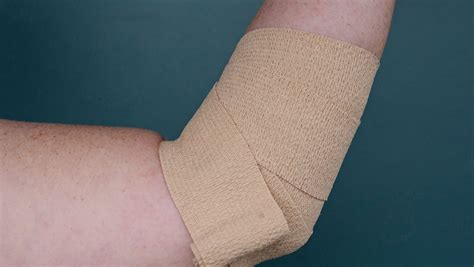 How to Wrap Tennis Elbow and Use KT Tape