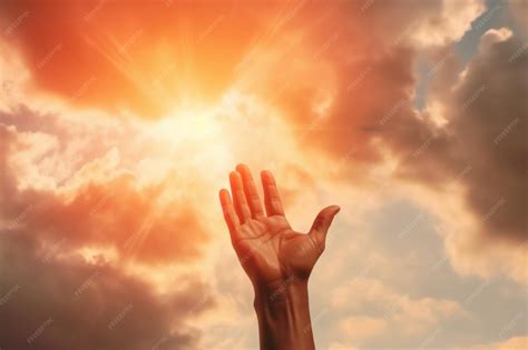 Premium AI Image | A hand reaching up to the sky with the sun shining ...
