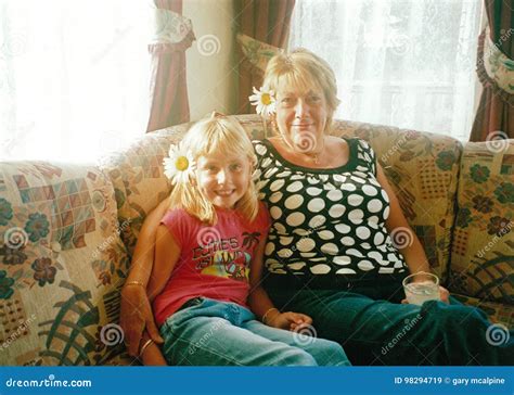 Granny and granddaughter editorial stock image. Image of flowers - 98294719