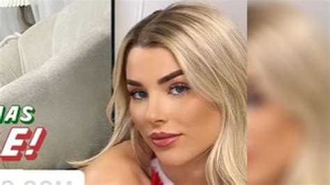 Glamorous footballer Madelene Wright leaves little to the imagination in festive lingerie ...