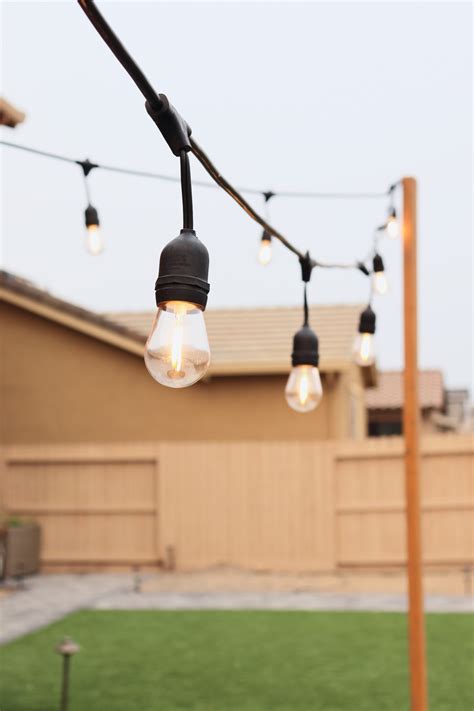 DIY String Light Posts – Home with Emily Jean