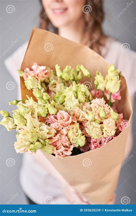 Small Beautiful Bouquets of Mixed Flowers in Woman Hand. Floral Shop ...