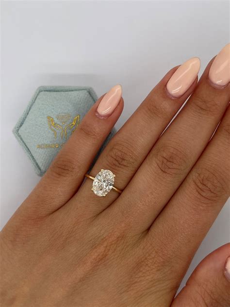 Oval solitaire engagement ring – Artofit