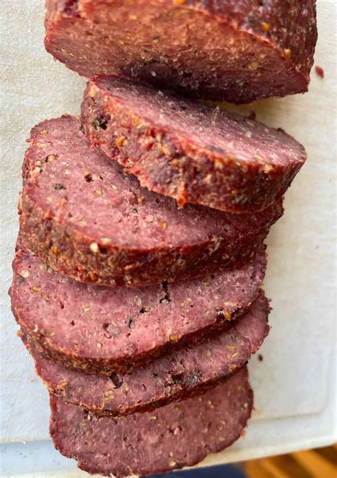 Venison Summer Sausage Recipe in the oven - A Ranch Mom