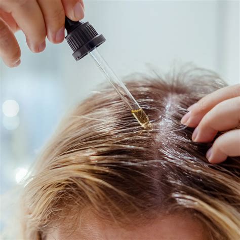 4 Hair Oil Serums To Soothe Flaky, Dry Scalps For Thinning Hair - SHEfinds