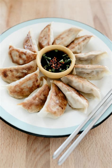 veggie potstickers with spicy dipping sauce — molly yeh