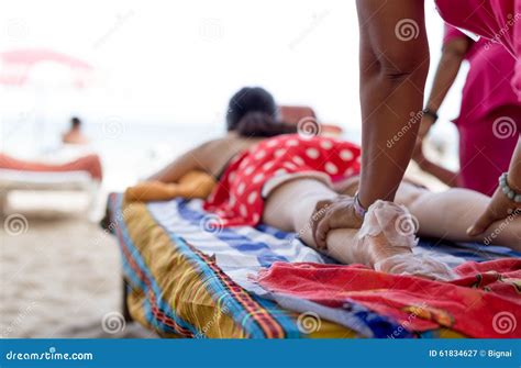 Woman Having Foot Scrub and Massage on the Beach Stock Image - Image of ...
