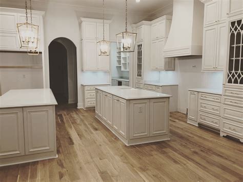 natural oak floors white kitchen - Joesph Bolduc