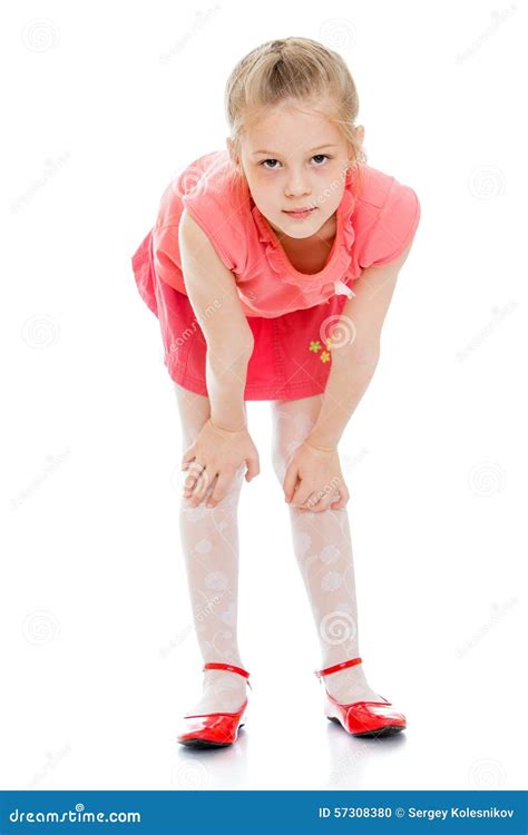 The Girl Bent Over and Looking at the Camera Stock Photo - Image of ...