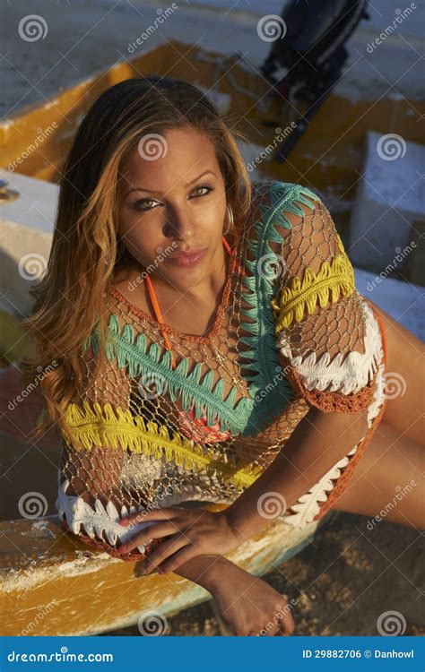 Latina Beauty on Small Boat Stock Photo - Image of bikini, golden: 29882706