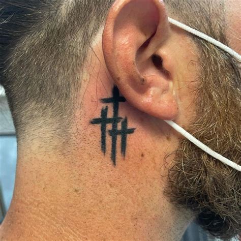 Cross Behind Ear Tattoo