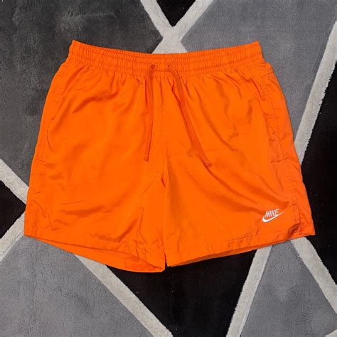 Large orange nike woven shorts. -embroidered... - Depop